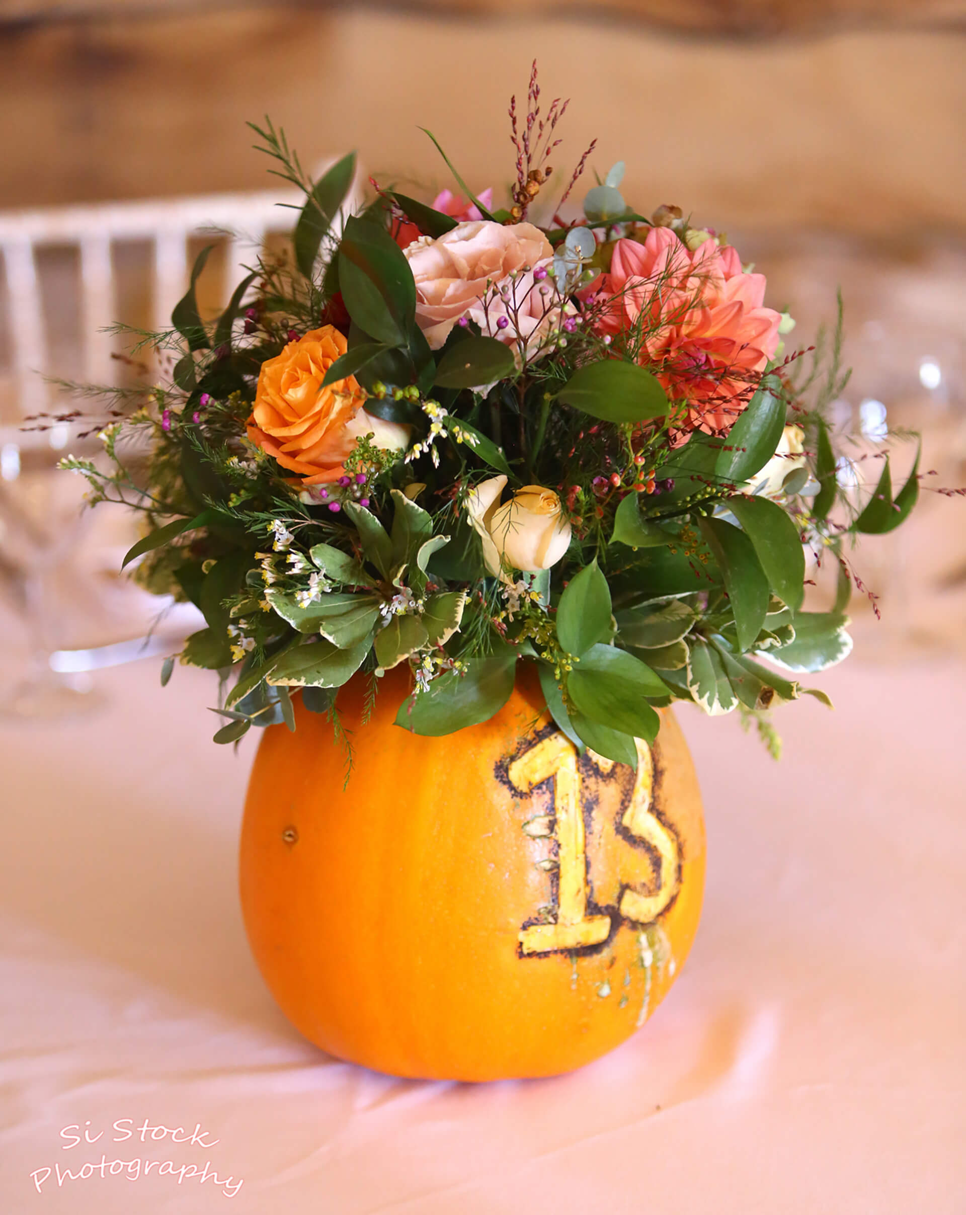 We love these pumpkin centrepieces at Roseanna and David's wedding, curtesy of Rosie Buffery Foliage and Floristry.  Captured by Simon Stock.