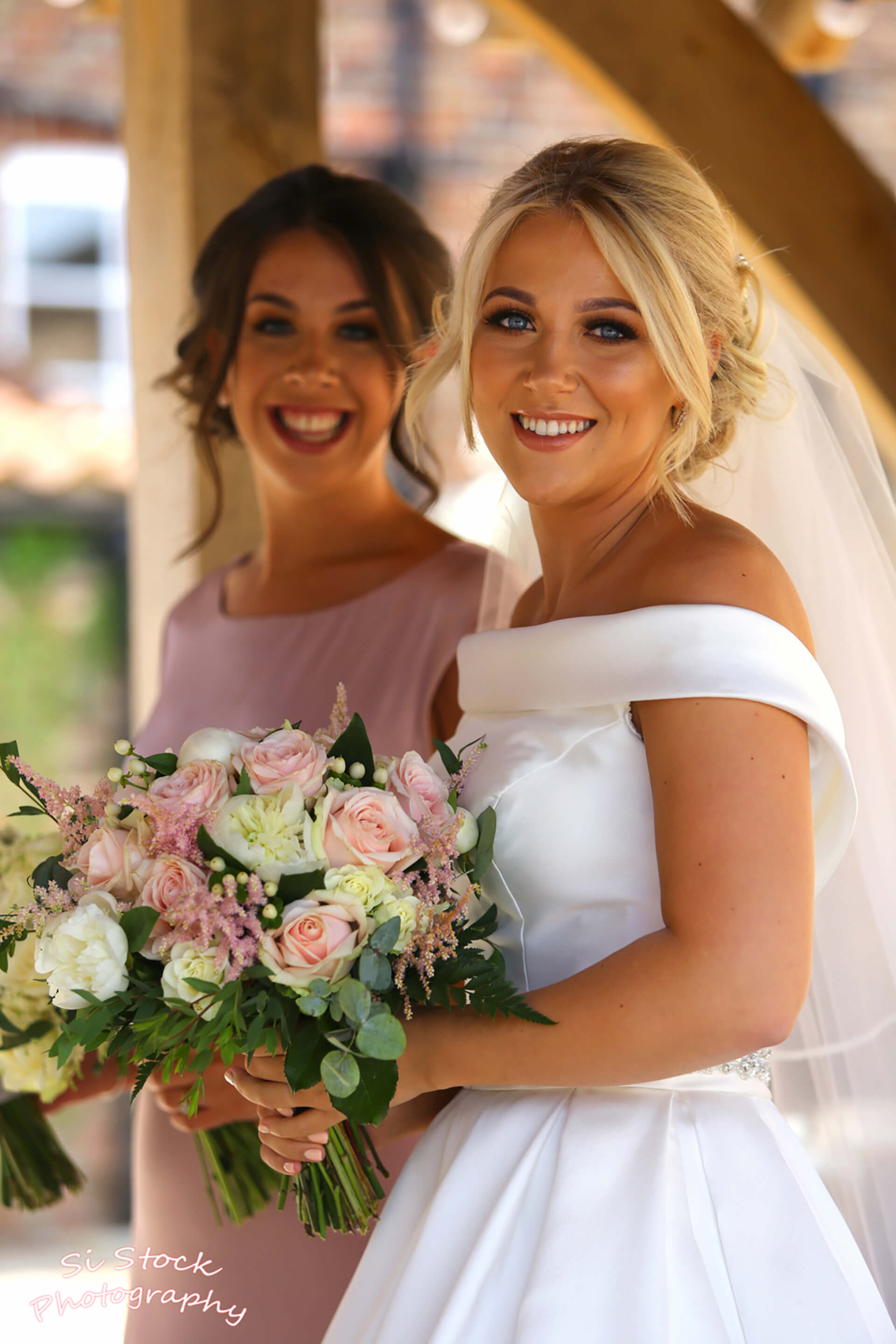 Our beautiful bride Rebecca and her bridesmaid captured by our very own Simon stock. 